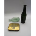 A green glass LMS Hotels bottle, Spiers & Pond glass flask and a GWR tin (3)