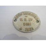 A cast iron B.R (M) General Repair wagon plate dated 1971, face restored