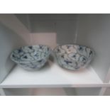 A pair of Tek Sing Treasure blue and white bowls from Nagel Auctions. Approximately 15cm diameter