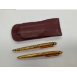 A set of Cartier Panthere cased pens, ballpoint and fountain, leather pouch, with certification,