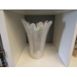 A large white glass vase with frilled edge. 29cm high