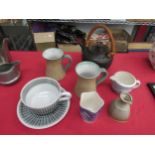 A selection of Studio pottery including a Leach standard ware teapot