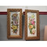 Two porcelain plaques depicting flowers in decorative gilt frames. One signed W.Rayworth. 42cm x