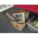 A box of assorted pictures and prints