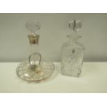 A Royal Doulton crystal glass decanter by Webb Corbett and a ships decanter with silver collar by
