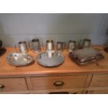A quantity of silver plate serving dishes including lidded entree dish and six tankards including