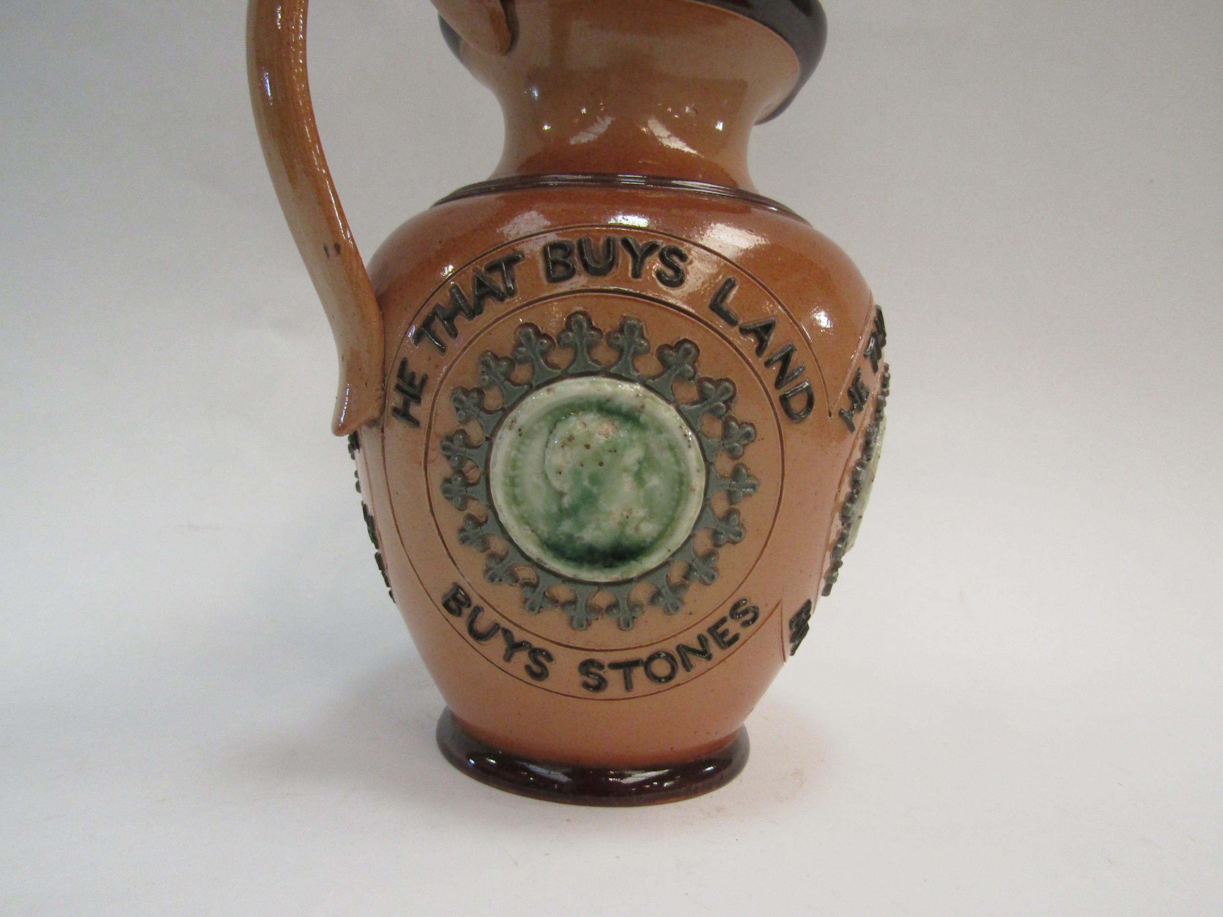 A Doulton Lambeth stoneware motto jug "He That Buys Land Buys Stone", "He That Buys Good Ale Buys - Image 3 of 4