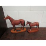 A Royal Doulton horse figure and Beswick Connoisseur model of 'Red Rum' 20cm x 26cm and 30cm x