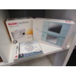 A Nintendo DS lite with Brain Training game together with a Kodak Easyshare digital camera