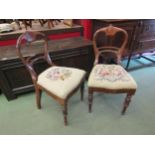 A pair of early 19th Century mahogany chairs with carved decoration the needlepoint floral