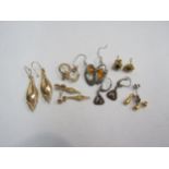 A small quantity of earrings including drop and stud