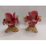 A pair of Murano art glass candlestick holders of floral form