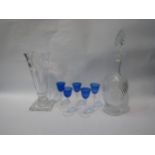 A set of five blue-bowled liqueur glasses, a cut glass decanter and a cut glass vase