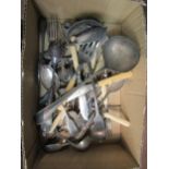 A box of assorted silver plated wares including ladles, fish knives, etc