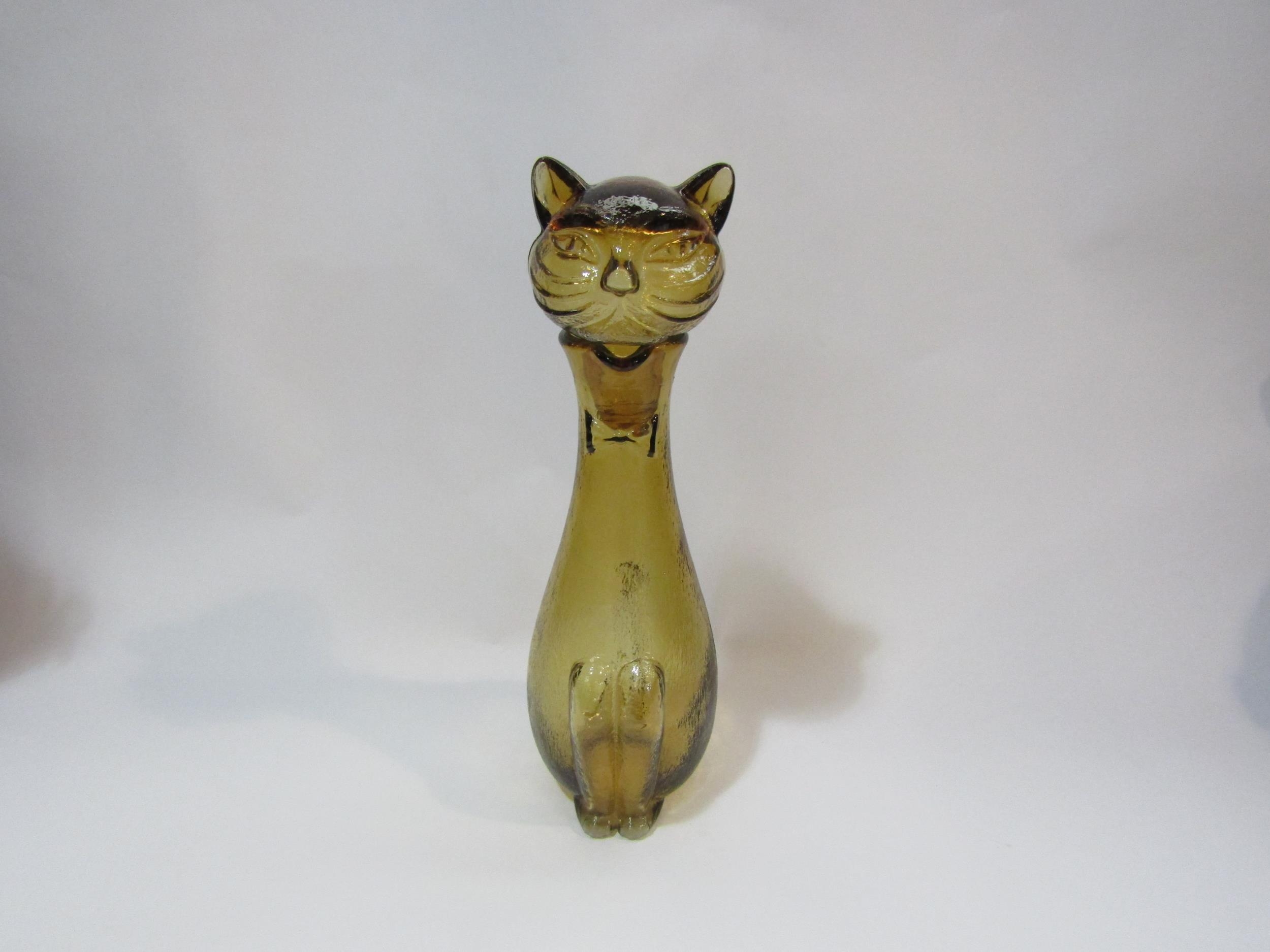 An Empoli amber glass cat form decanter, 33cm tall