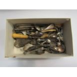 A box of plated wares including sugar tongs, scoop, salt spoons etc also bone spoons and silver