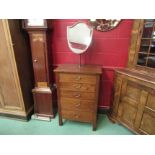 An Edwardian mahogany gentleman's shaving chest the height-adjustable shield shaped tilting mirror