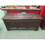 A 19th Century oak three panel coffer with key, split to top, 61cm x 138cm x 54cm