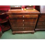 A 19th Century French walnut chest of four drawers on a plinth base (Evidence historic woodworm)