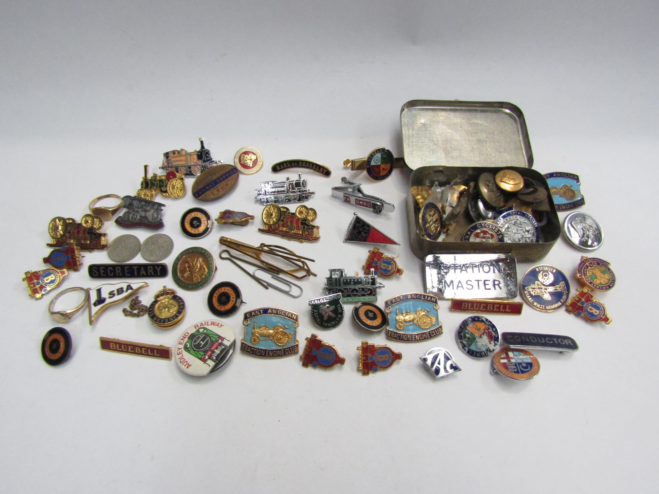 A collection of badges including Railway and Military