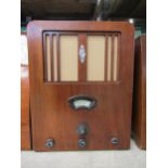 A Cossor Melody Maker 357 kit radio in Art Deco walnut veneered wooden case. C.1935