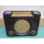 A Bush DAC90A brown Bakelite cased valve radio, serial number 73/23158. C.1953