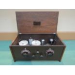 A Cossor 'Melody Maker' model 234 battery TRF kit valve radio in oak case, serial number 104488. C.