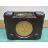 A Bush DAC90A brown Bakelite cased valve radio, serial number 73/11548, C.1953