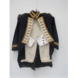 A child's naval barathea cloth uniform tail coat, waistcoat and trousers with gilt metal thread