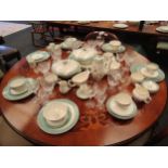 A Midwinter stylecraft dinner service including plates, tureens, teapot and cups