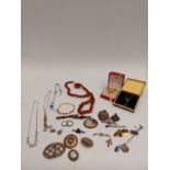 A quantity of bijouterie including glass bead necklaces, rolled gold pendant, gold plated cufflinks,
