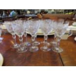 Nine similar wine glasses