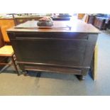 A 17th Century & later hinged lid coffer with base drawer over turned feet. 82cm x 110cm x 47cm