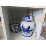 An Oriental blue and white ginger jar form lamp and similar jardiniere (2)