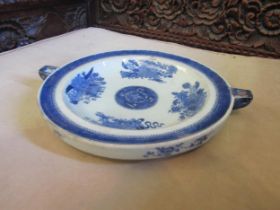 A Chinese style blue and white warming dish with small bird (Emu?) motif to rim. 25cm diameter