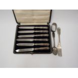 A cased set of silver handled knives and associated silver fork, teaspoon and napkin ring