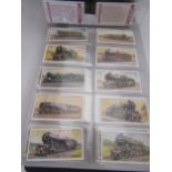 A quantity of Railway cigarette cards in album, includes several complete sets plus some odds
