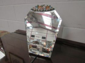 A free-standing barbola mirror