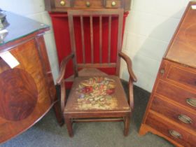 A Georgian carver chair with tapestry drop-in seat. Seat worn