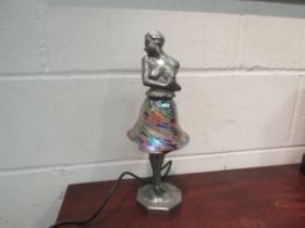 A 1920's style Brevette cast alloy lamp of a semi-clad lady with iridescent shade as a skirt, 36cm