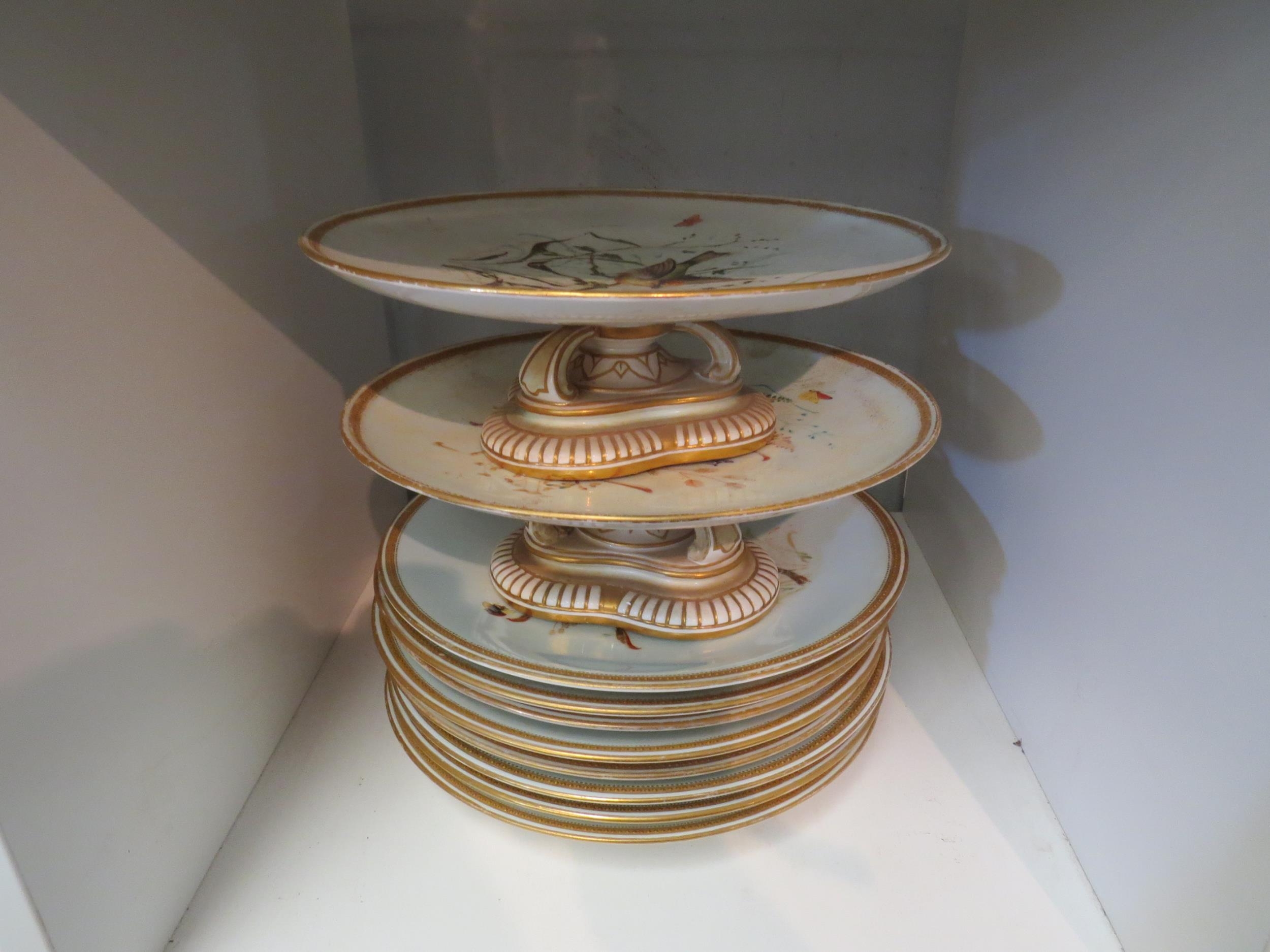 A collection of Worcester hand-painted and jewelled table ware; eight plates and two comports (10)