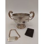 A silver twin handled trophy with banded detail, together with snuff box and USA sterling ID