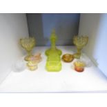 A collection of glass to include vaseline glass scent bottle and salts, art glass salts, etc. (11)