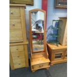 A pine cheval mirror with a drawer, 150cm high