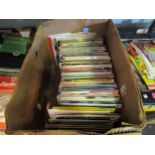 A box of 1960's vinyl LP's and singles