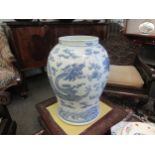 A Chinese blue and white urn of large proportions, restored. 51cm height.