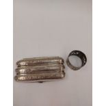 A nickel silver engraved cigar case and an HMS Rodney napkin holder (2)