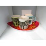 A set of three Hornsea animal mugs and a Poole Pottery dish