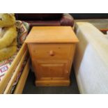 A pair of country pine bedside cabinets. 60cm high x 39cm wide x 28cm deep