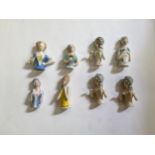 Eight glazed china half dolls and pin cushions including Deco Female